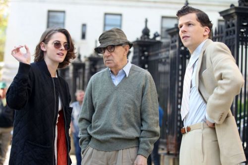 Woody Allen accompanied by Kristen Stewart and Jesse Eisenberg on the set of Allen’s latest movie, C