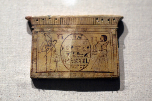 Ancient Egyptian pylon-shaped pectoral (faience) with a drawing of a heart scarab.  Artist unkn