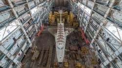 nowonlyghosts:  staceythinx:  The ruins of the Soviet space shuttle program captured by photographer Ralph Mirebs   Way cool  