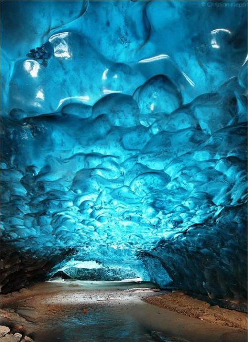 This is an ice cave, known as “crystal Cave” on the frozen lagoon of the Svínafellsjökul