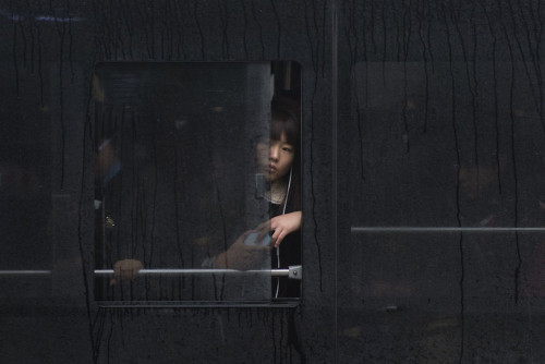 archatlas:  Moments of Life Captured on the Bus    Zhang Jia Wu captures his images almost exclusively on the bus as people let their minds and expressions wander. What makes Zhang’s photos so compelling is that each seems to show a moment rife with