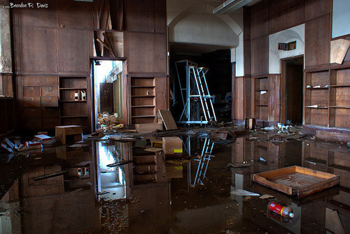 bookporn:  copperbadge:  kingsgrave:  bookporn:  Abandoned: Mark Twain Branch Detroit Public Library by Brandon P. Davis Flickr | Tumblr | Facebook  This is the way the world ends…  I always figured if the apocalypse does come, I’m heading for the