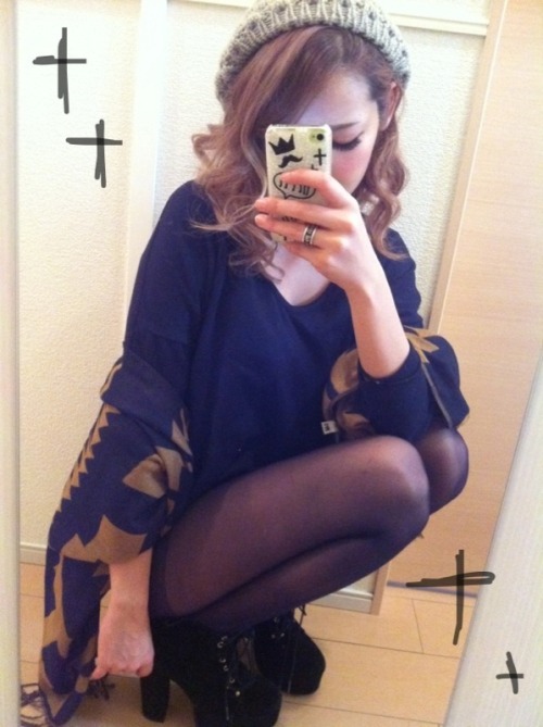 Selfshot of an asian fashion girl in black pantyhose. Selfie in pantyhose
