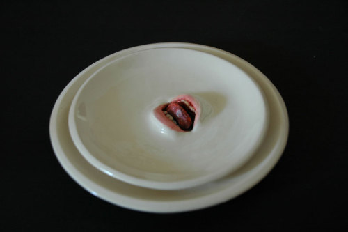 from89:  Ceramic tableware with mouths (by Ronit Baranga) 