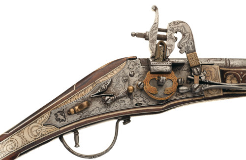 A very lovely 16th or 17th century wheel-lock pistol with scrimshaw decorated ivory stock inlays.