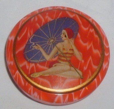 Vintage celluloid Art Deco bathing beauty powder compact. Producer unknown. Found on Pinterest.