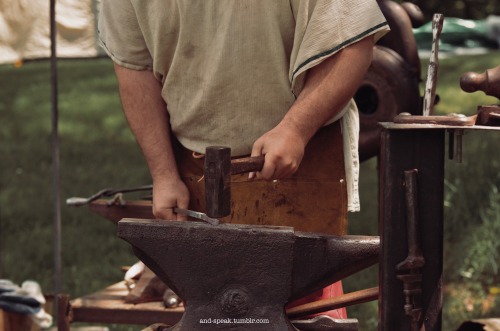 one of my smithy friends working his forge last weekend[image description: four photos of a white ma