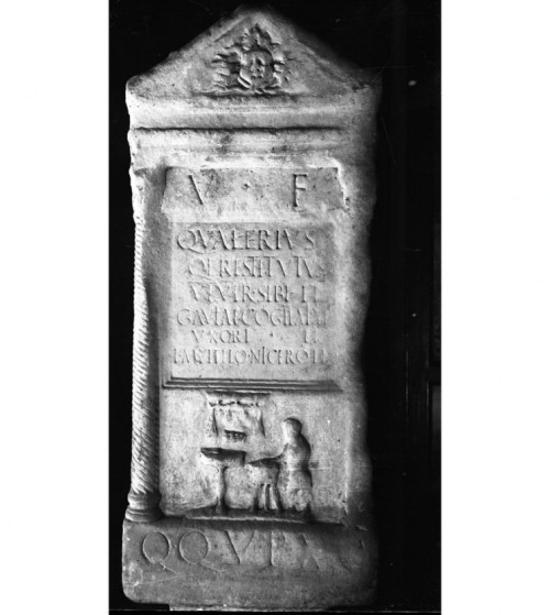 Funerary stele, made of limestone, of the freedman and sevir Q. Valerius Restitutus. Still alive, he