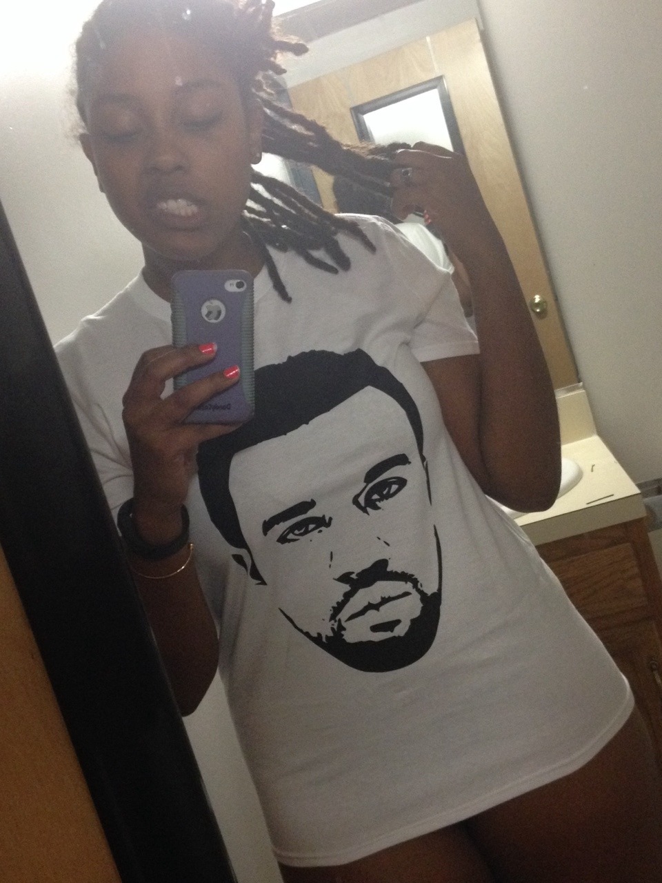 hipsandheartbreak:  dirty mirror selfies in my new shirt. check out brklynbreed 