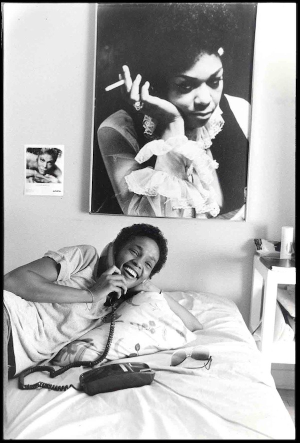 classicladiesofcolor:  Teenage Whitney Houston with photos of her mother (Cissy)