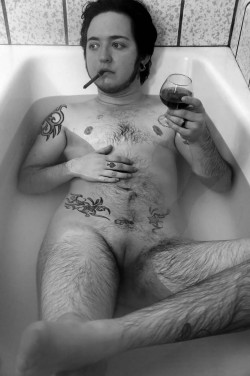 tension-and-spark:  PhotographerMy vices are bath tubs and bourbon.