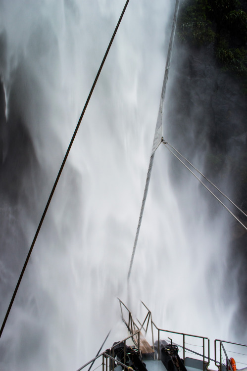 Washing the boat on a Milford Sound cruise.Milford Sound, Fiordland, South Island, New Zealand