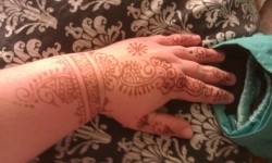 In the process of trying to speed up the process of fading the henna that I got while on my trip. :(  It is really beautiful and I am really sad to have to get rid of it, well part of it.  But, after today, I found out that unless I want to wear gloves