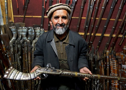 peashooter85:Kabul shopowner Sher Mohammed has pretty good business selling replica jazail muskets t