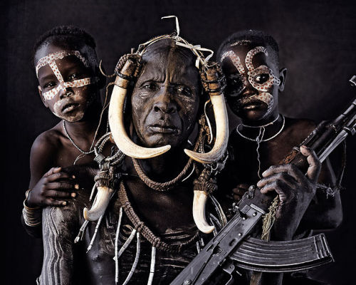 house-of-gnar:  Mursi tribe|Great Rift Valley “The nomadic Mursi tribe lives in the lower area of Africa’s Great Rift Valley. Extreme drought has made it difficult to feed themselves by means of traditional cultivation and herding. The establishment