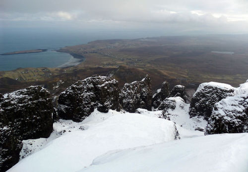 everskye:  Quiraing, 22.01.15, featuring Cleat, Bioda Buidhe, Beinn Edra, the Trotternish Ridge, The Table, an overview of Staffin Bay and the surrounding community and Staffin Island. It was fiercely windy on the summit. Quiraing - Isle of Skye. 