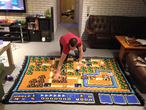 heck-yeah-old-tech:  kevac11:  (vía My friend used 6,5 years (800 hours) to make this awesome Super Mario blanket - Album on Imgur) Amazing,  That’s way too hardcore.  want!