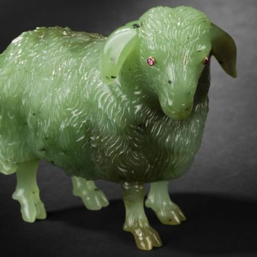 treasures-and-beauty: Carved nephrite jade sheep, eyes ornamented with ruby cabochons. 20th century