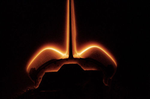 Glow phenomenon surrounding the vertical stabilizer and OMS pods, 05/04/1994 STS062-42-026 – NASA