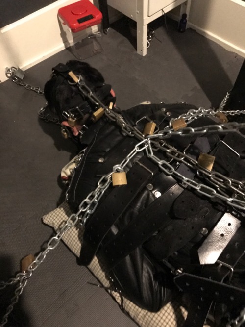 seabondagesadist: The “rest” for @lostinsea88 didn’t last all that long before I decided that it was simply not enough bondage and needed correction. A modified straightjacket hogtie was called for.  His legs pulled up and locked to chains around