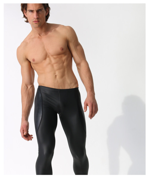 rufskin:  New Style Alert: KANG Performance tights constructed from a flat finish “rubber-look” poly-spandex blend featuring 4-way stretch. Focal point of design: a contrasting yoke panel, composed of stretch nylon-spandex with a shiny finish, swooping