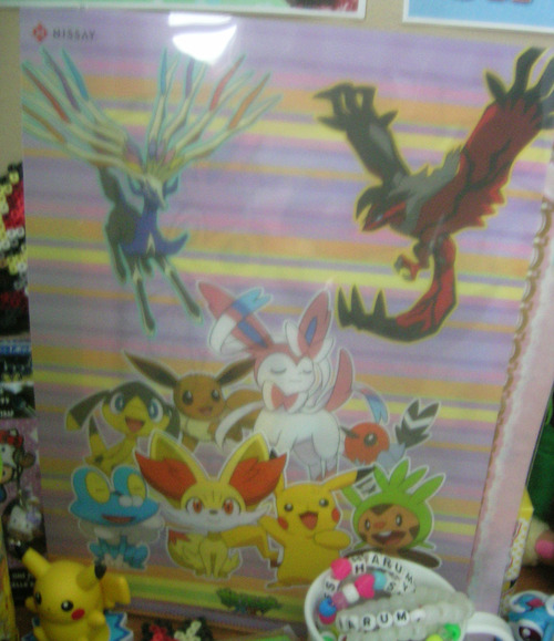 speaking of pokemon, i got a little package from my friend ;o; rare sylveon items eeee, the folder on the left was a freebie you could get when you preordered XY in Japan and wasn’t for sale in stores on the right is a mini soccer ball with all