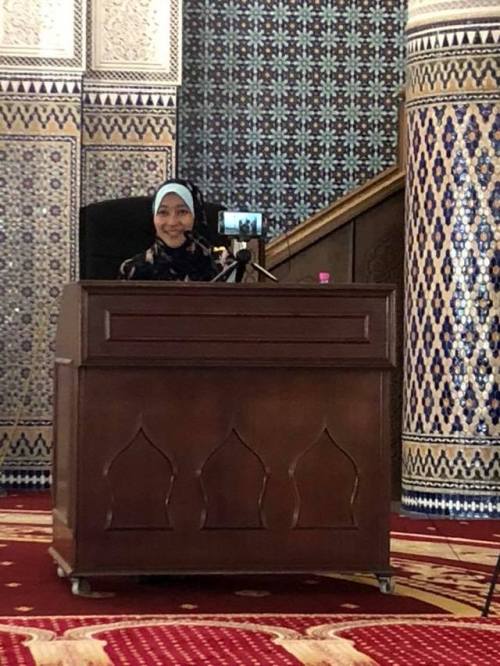A shaykha teaching a mixed gender class at the National Mosque of Malaysia, Masjid Negara, in Kuala 
