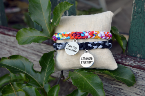 Motivational bracelets that are handmade from recycled swimsuit material. Perfect reminders to stay 