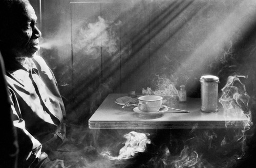 blackpicture:Harold Feinstein Man smoking in 14th Street Diner. New York City (1970)