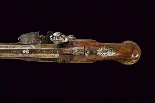 Ornate flintlock pistol crafted by Diego Zanoni of Brescia, Italy, mid 18th century.from Czerny’s In