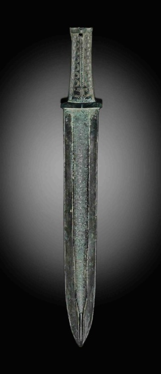 Chinese bronze dagger, Waring States Period, 3rd Century BC.from Christies