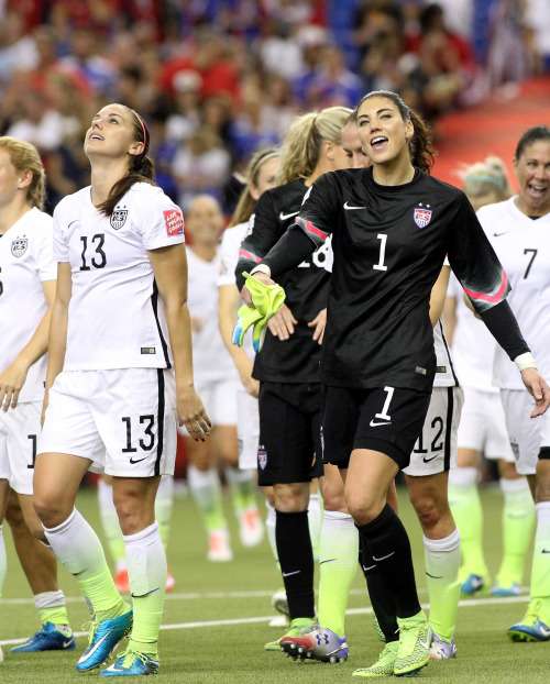 uefadaily: Alex Morgan and Hope Solo celebrate the 2-0 victory against Germany | June 30, 2015