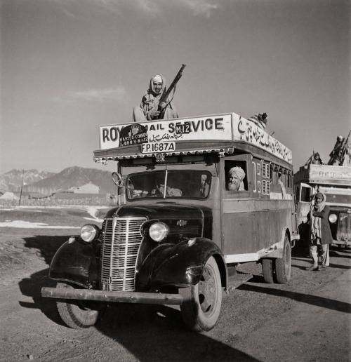 A Royal Mail bus with armed guards heads out from Razmak to Jandola, April 1946.Photograph by Maynar