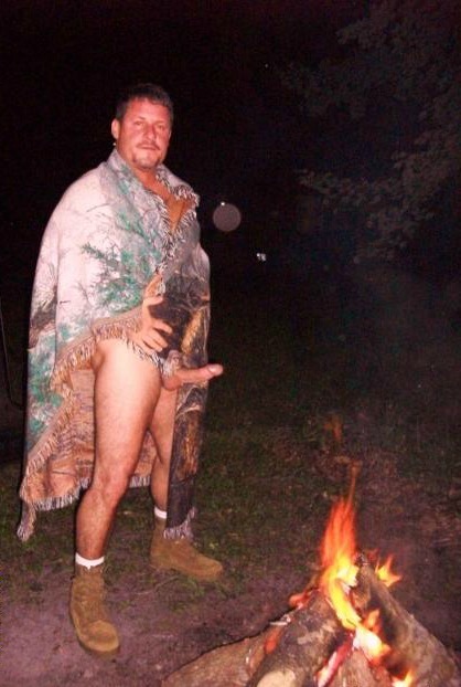 campingmen:  Love the warm glow of the campfire in these pics. http://campingmen.tumblr.com/ 