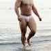 luvmusclesblog:musclehunkymen:Beefy, hunky, handsome built Latino muscle!  He sure can fill-out his clothes… and not.