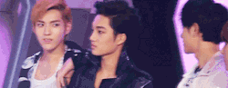 sutaeng:  Kris giving Tao the flirty eyebrow