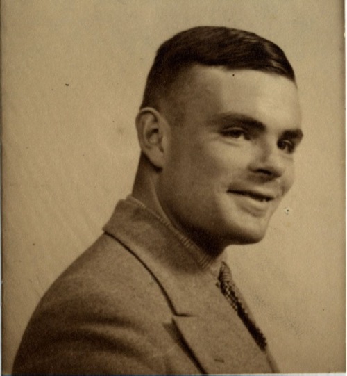 almaviva90:   Alan Turing posing for his passport photograph, c. 1930s - c. 1940s (from the archives of King’s College, Cambridge)  It’s always sad to remember how such a great man’s life was needlessly cut short but at least we can get a small