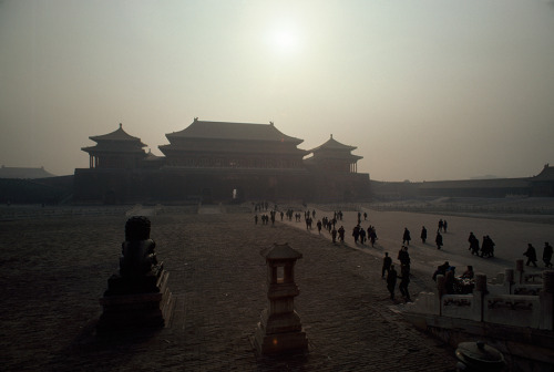 The huge Gate of Heavenly Peace, the main entrance to the Forbidden City in Beijing, looms in the du