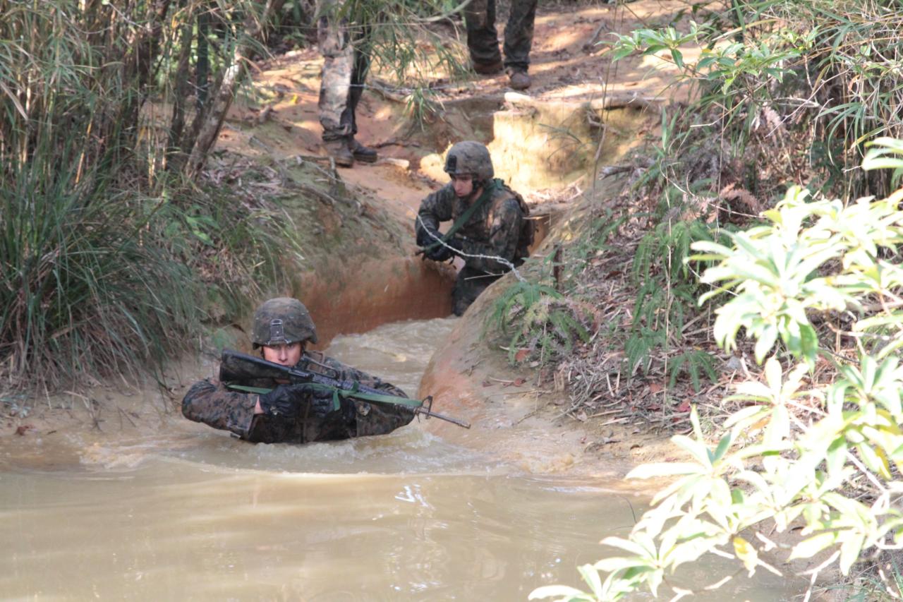 ceebee23:  CAMP GONSALVES, Okinawa, Japan - Lance Cpl. Remington Ostrem wades into