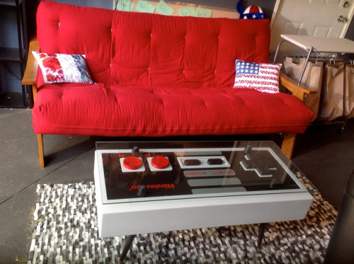 geek-studio:  Nintento Controller Coffee Tables  These handmade coffee tables by Bohemian Workbench are also FULLY FUNCTIONING CONTROLLERS! They can be plugged in and are compatible with Nintendo Wii. 