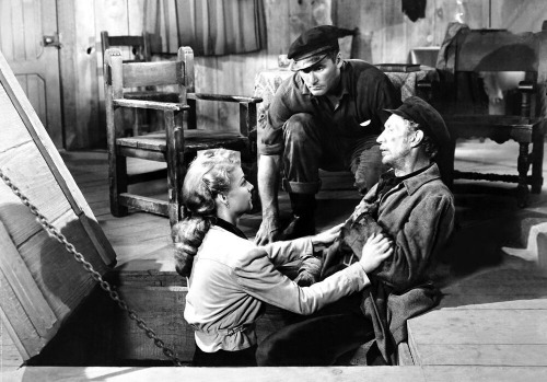 Errol Flynn, Ann Sheridan and Walter Huston in Edge of Darkness (1943)