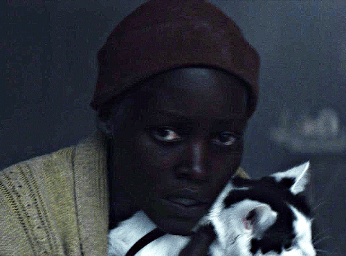 LUPITA NYONG'O As SAM (featuring Some Frodo)A QUIET PLACE: DAY ONE (2024) Dir. Michael Sarnoski