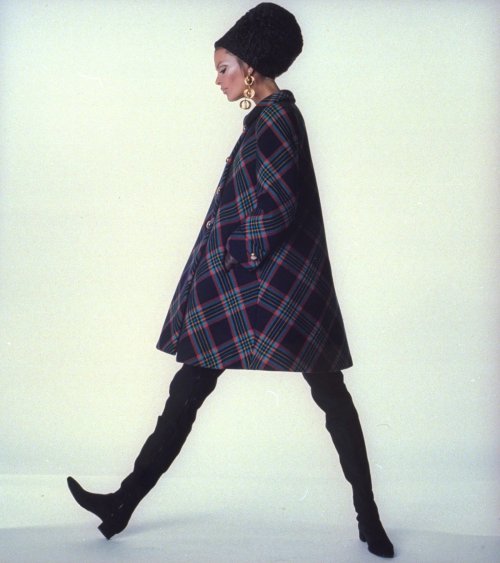 vogue:  Was there ever a shoe more coveted over the years than the thigh-high boot?Here, see a brief history of fashion’s kinkiest boots and the woman who wore them.Photographed by Irving Penn