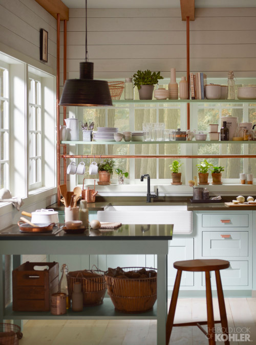 With copper details, open shelving, and an apron-front sink, this kitchen shows just how beautiful s