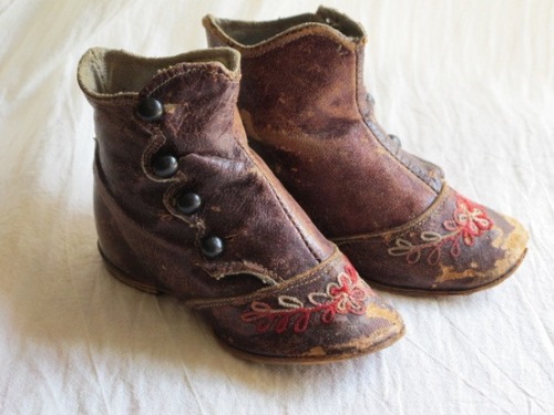 Victorian embroidered and buttoned brown leather baby’s booties, c. 1870.