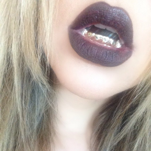 codeinelord:  khloekardashianfashionstyle: khloekardashian - Thanks @rafaelloandco for making me my grill! I love dressing all of my MANY moods   FRENCH MONTANA IS THE MAN