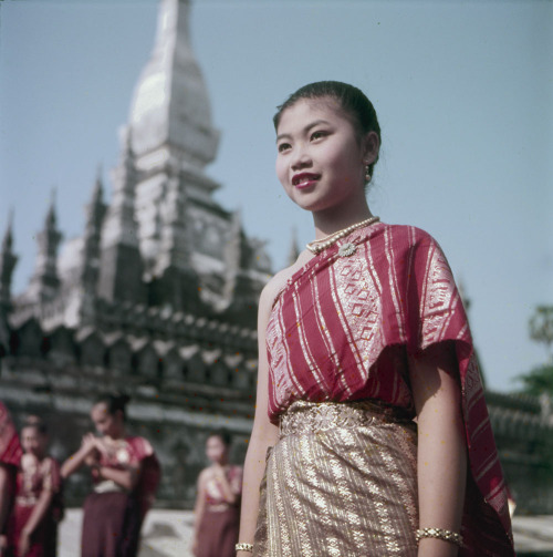 Schoolgirls in Laos performing traditional dances, 1955(via Library and Archives Canada)