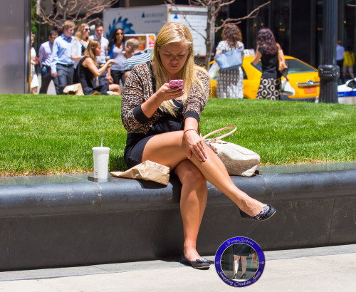 Thick, pretty bronzed crossed legs