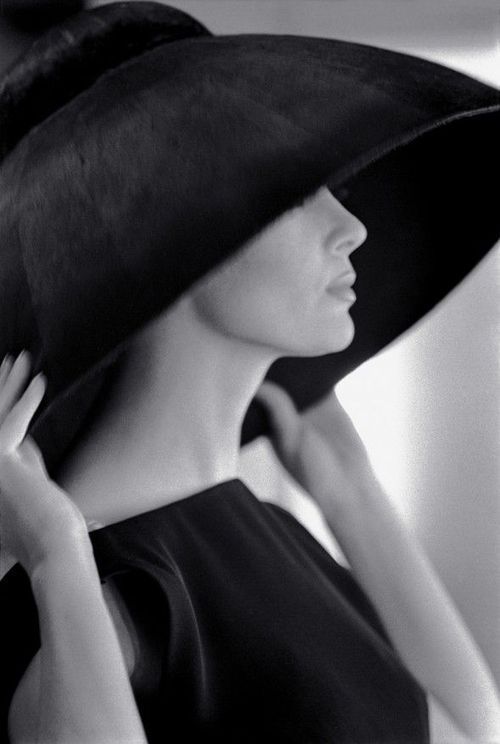   Model Jean Newington wearing a Yves Saint Laurent hat, 1962. Photo by Jerry Schatzberg