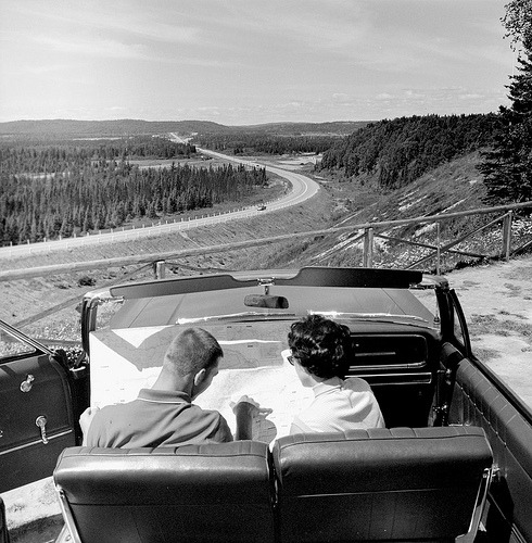 fuckyeahvintage-retro:  A couple do a little map reading. Canada, 1950s © GC 